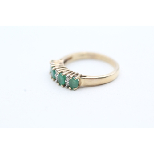 220 - 9ct gold diamond and emerald row ring (2.7g) Size N 1/2