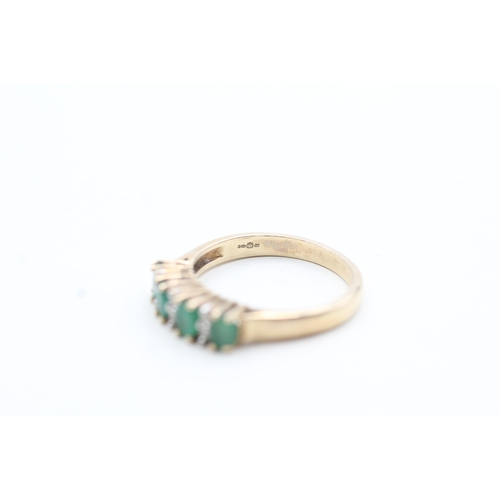 220 - 9ct gold diamond and emerald row ring (2.7g) Size N 1/2