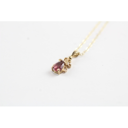 232 - 2x 9ct gold ruby drop earrings & necklace