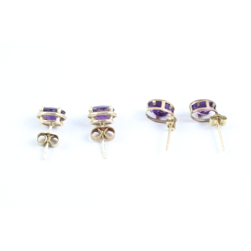 233 - 2x 9ct gold amethyst stud earrings