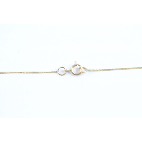 26 - 9ct gold round diamond pendant on chain