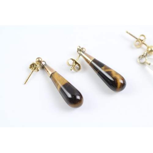 29 - 2x 9ct gold tiger-eye & rock crystal drop earrings