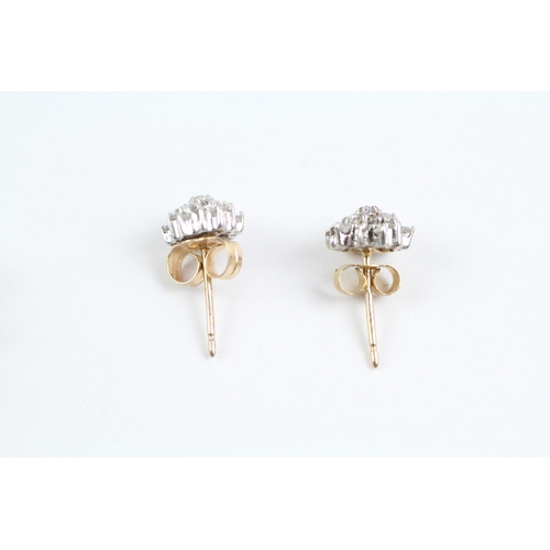 55 - 2x 9ct gold diamond stud earrings