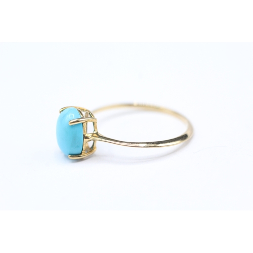 6 - 9ct gold blue gemstone claw set ring (1.3g) Size Q