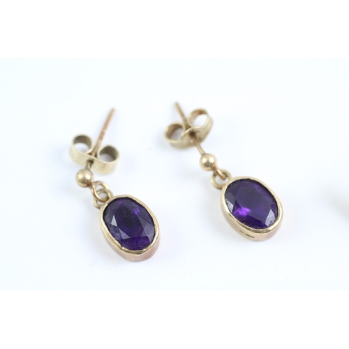 73 - 2x 9ct gold amethyst stud & drop earrings