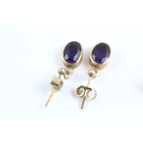 73 - 2x 9ct gold amethyst stud & drop earrings