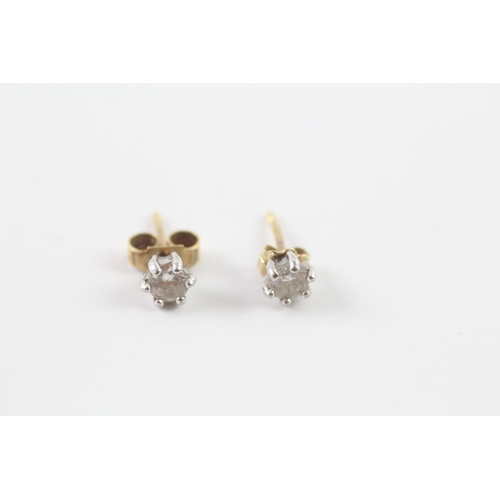 82 - 18ct gold diamond solitaire stud earrings