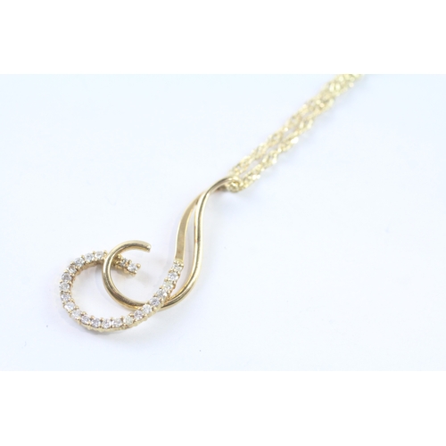 83 - 18ct gold diamond pendant w/ 18ct gold chain