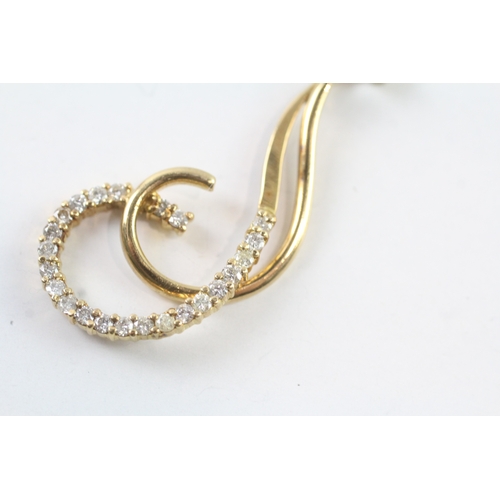 83 - 18ct gold diamond pendant w/ 18ct gold chain