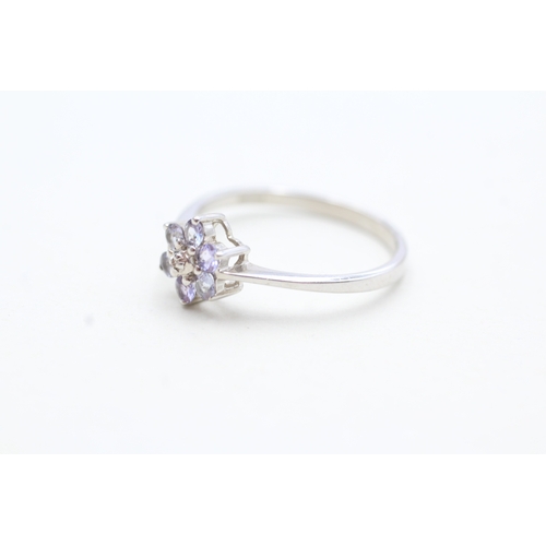 87 - 9ct gold tanzanite & diamond cluster ring (2g) Size R