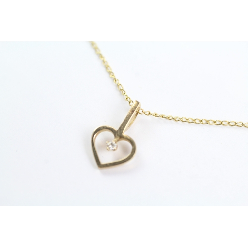 95 - 9ct gold diamond heart pendant on chain