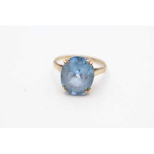 96 - 9ct gold vintage oval cut blue gemstone dress ring (2.7g) Size J