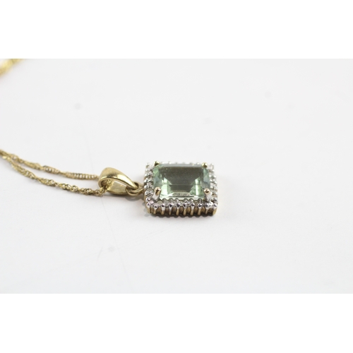 10 - 9ct gold blue gemstone and diamond pendant on chain