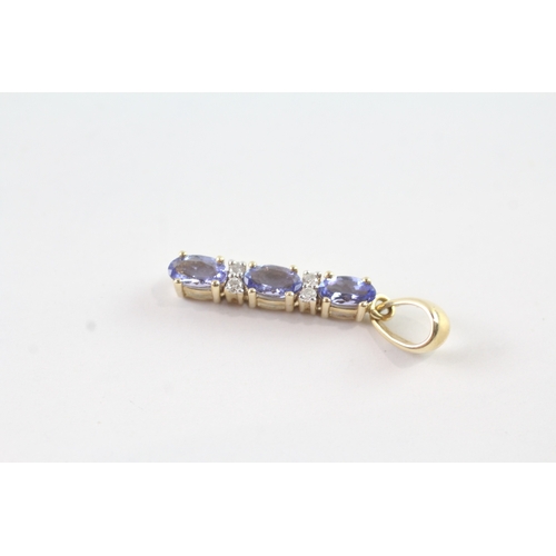 12 - 14ct gold diamond and tanzanite pendant