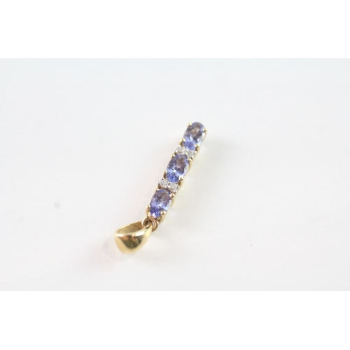 12 - 14ct gold diamond and tanzanite pendant