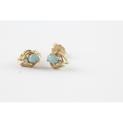 122 - 14ct gold larrimar and diamond stud earrings