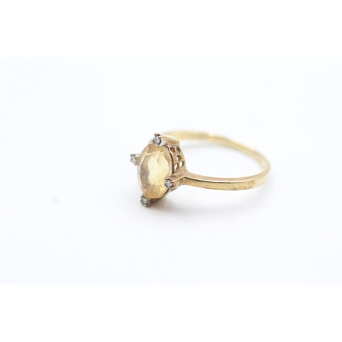 124 - 9ct gold diamond and citrine cross halo ring (2.3g) Size O