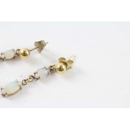 128 - 9ct gold opal drop stud earrings