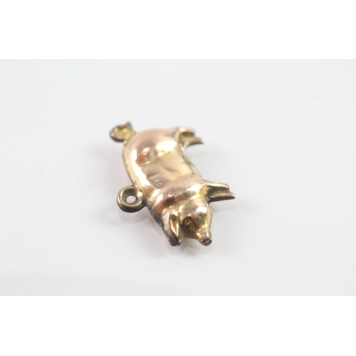 129 - 9ct gold vintage lucky pig charm