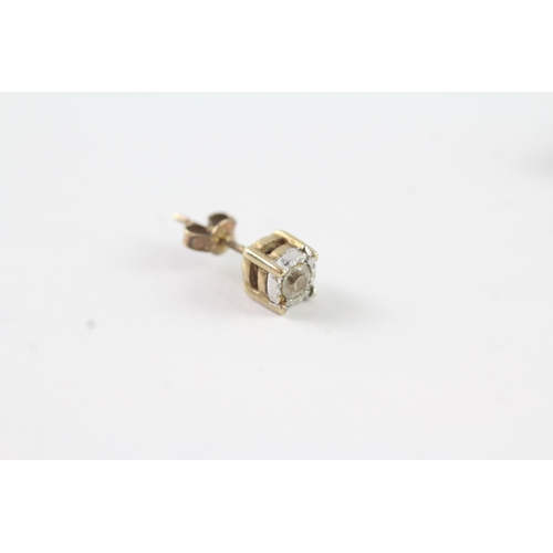 131 - 9ct gold diamond stud earrings