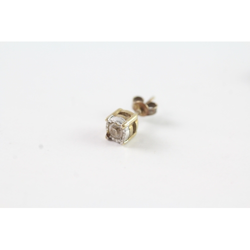 131 - 9ct gold diamond stud earrings