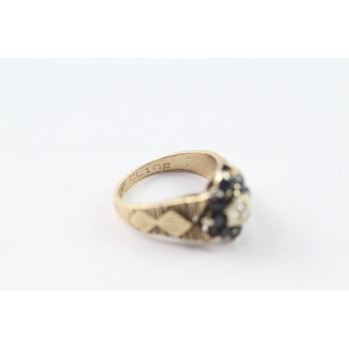 133 - 9ct gold diamond and sapphire halo ring (3.7g) Size J