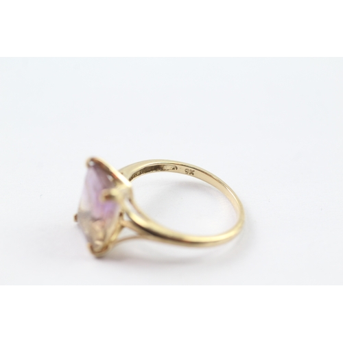 136 - 9ct gold ametrine dress ring, claw set Size O