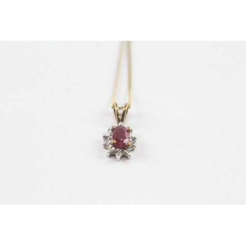 151 - 9ct gold ruby and diamond halo pendant w/ 9ct gold chain