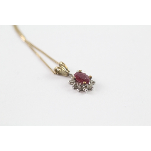 151 - 9ct gold ruby and diamond halo pendant w/ 9ct gold chain