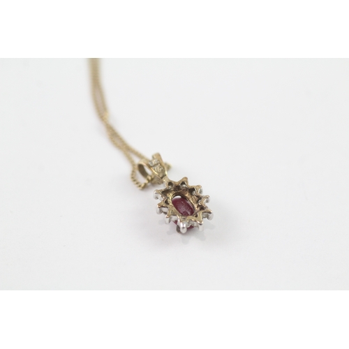 151 - 9ct gold ruby and diamond halo pendant w/ 9ct gold chain