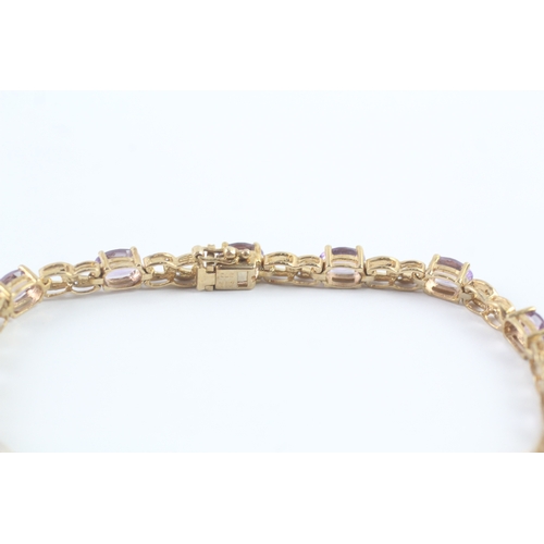 153 - 9ct gold amethyst and diamond tennis style bracelet