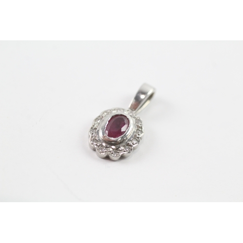 154 - 18ct white gold pair of pendants inc. ruby and diamonds