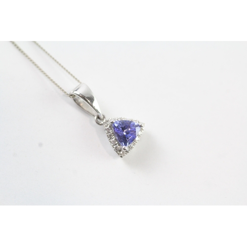 163 - 9ct gold diamond and tanzanite pendant and chain