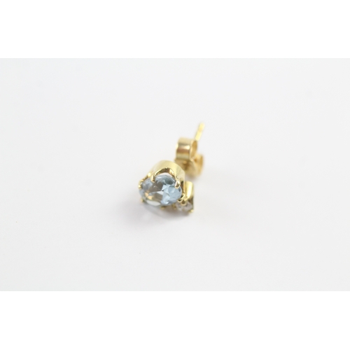 164 - 18ct gold blue gemstone and diamond stud earrings