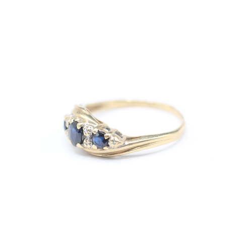 171 - 9ct gold sapphire and diamond ring (2.3g) Size P