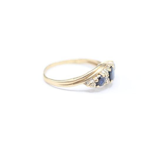 171 - 9ct gold sapphire and diamond ring (2.3g) Size P