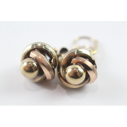 173 - 9ct gold knot effect stud earrings