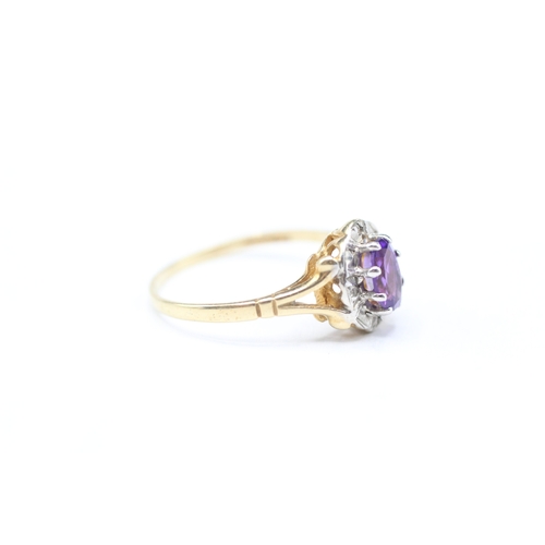 176 - 9ct gold amethyst and diamond halo set ring (1.4g) Size M