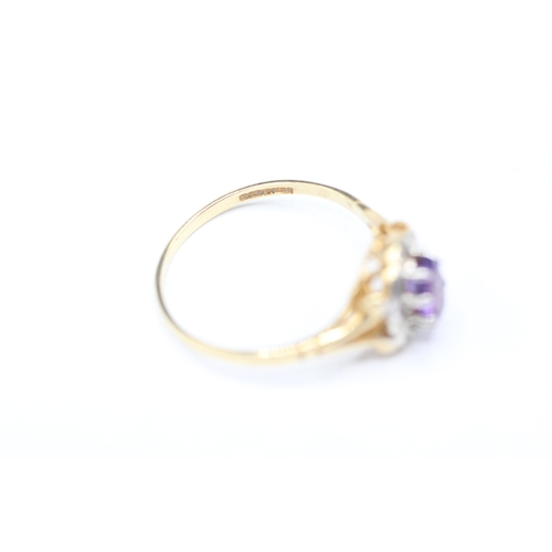 176 - 9ct gold amethyst and diamond halo set ring (1.4g) Size M