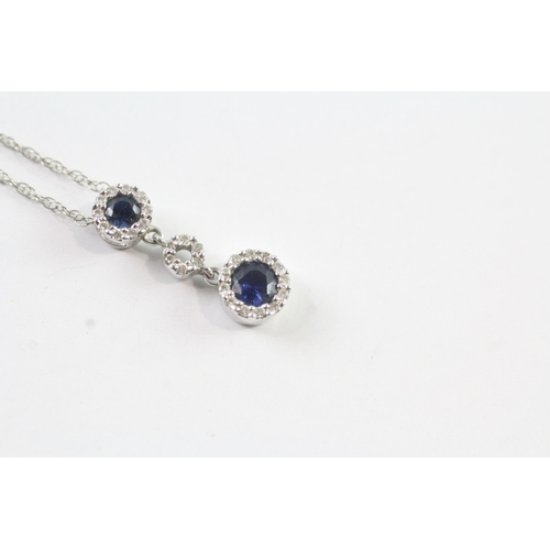 180 - 14ct white gold diamond and sapphire pendant and chain