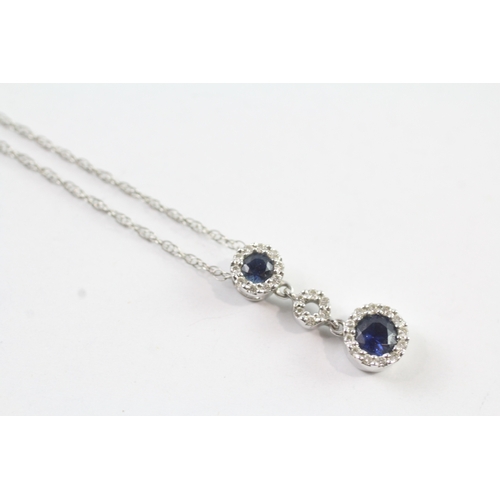 180 - 14ct white gold diamond and sapphire pendant and chain