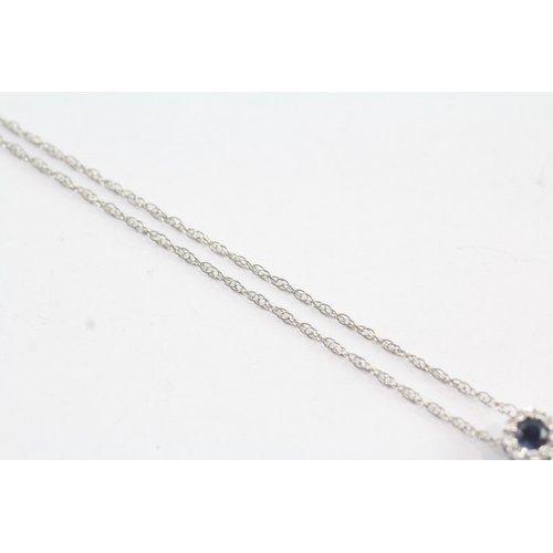 180 - 14ct white gold diamond and sapphire pendant and chain