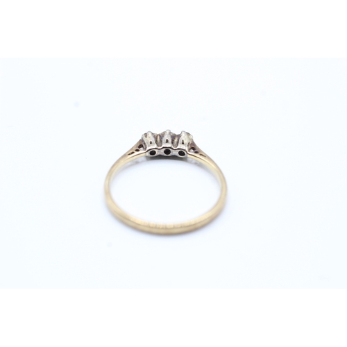 184 - 9ct gold three stone diamond ring (1.3g) Size L