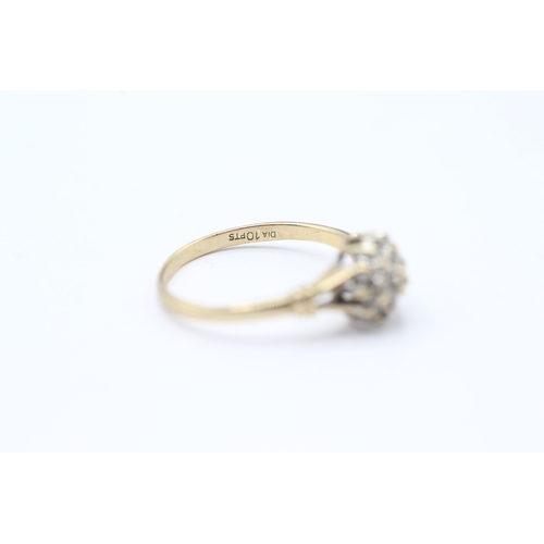 194 - 9ct gold diamond cluster ring (1.6g) Size N