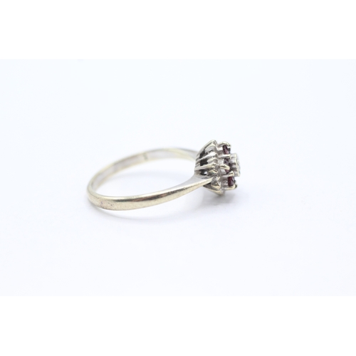 204 - 9ct gold garnet and diamond ring (2.8g) Size M 1/2