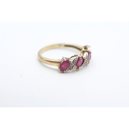 222 - 9ct gold ruby and diamond twist ring (1.9g) Size M