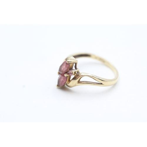 228 - 9ct gold pink gemstone twin ring (2.3g) Size Q