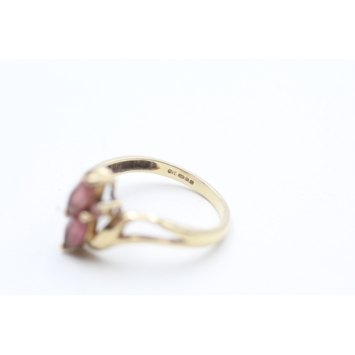 228 - 9ct gold pink gemstone twin ring (2.3g) Size Q