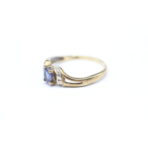 238 - 9ct gold blue gemstone and diamond ring (1.7g) Size M 1/2