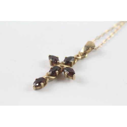 246 - 9ct gold garnet cross pendant on chain